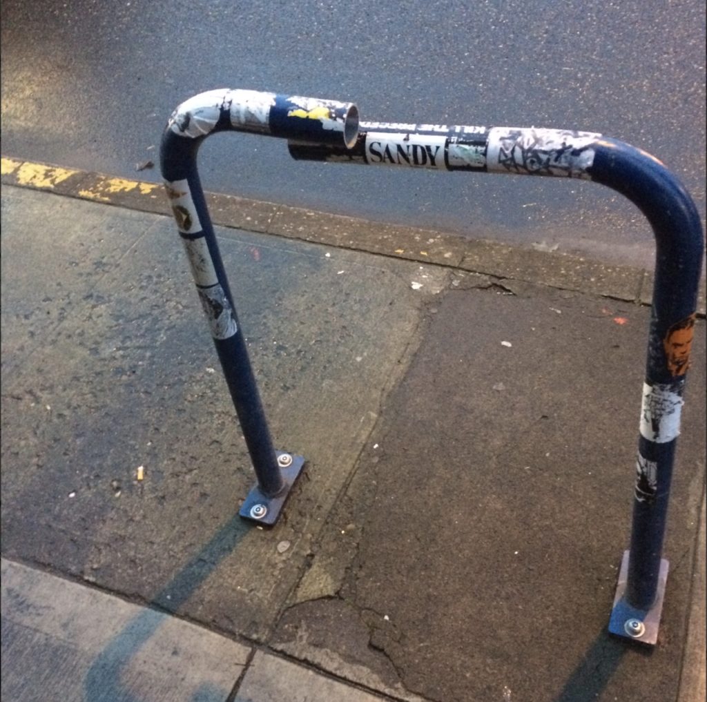 a bike rack that has been cut through